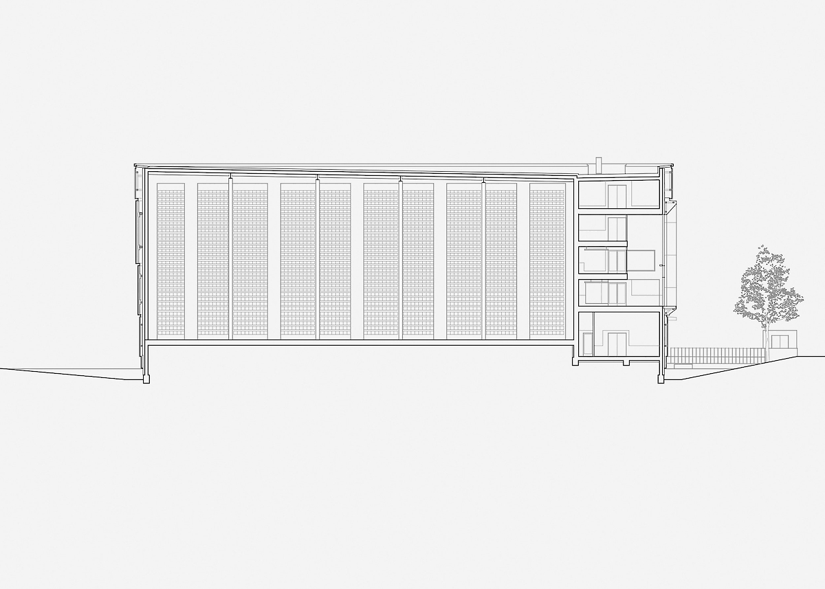 Cross-section through extension and raised warehouse